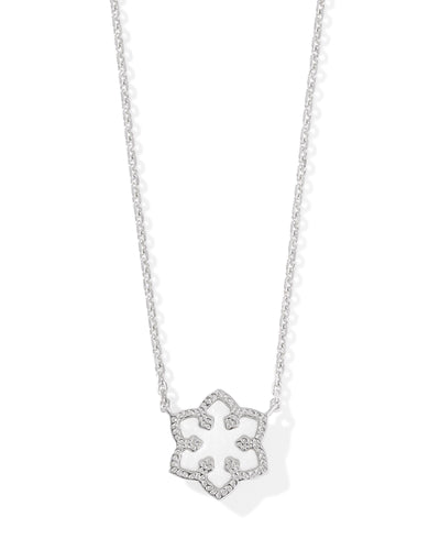 Silver necklace with silver framed white kyocera opal snowflake pendant, closeup front view.