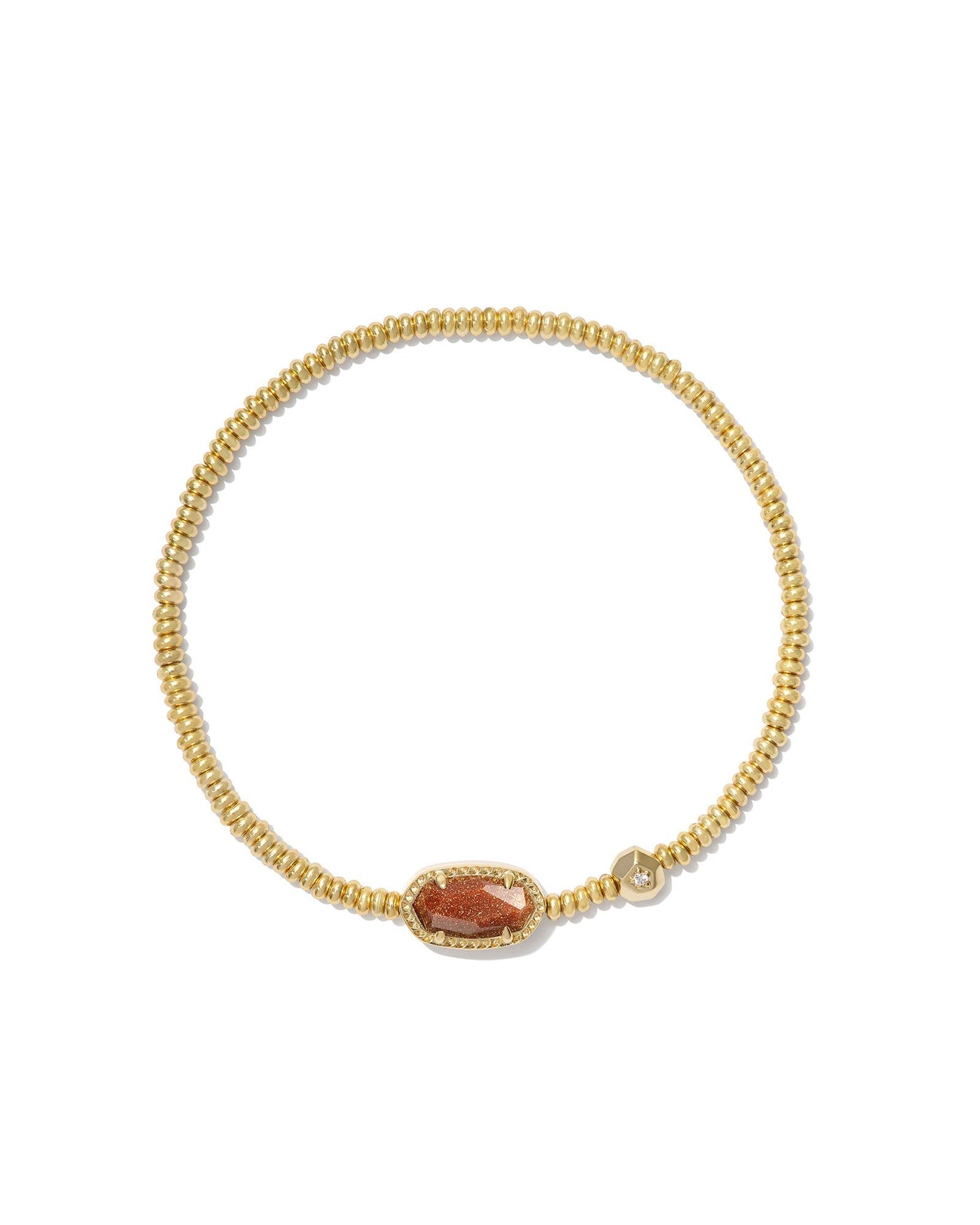 Kendra Scott gold beaded stretch bracelet with orange goldstone pendant.