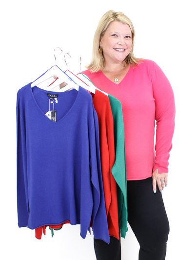 Charlie B Sweaters showing a multiple color pallet.