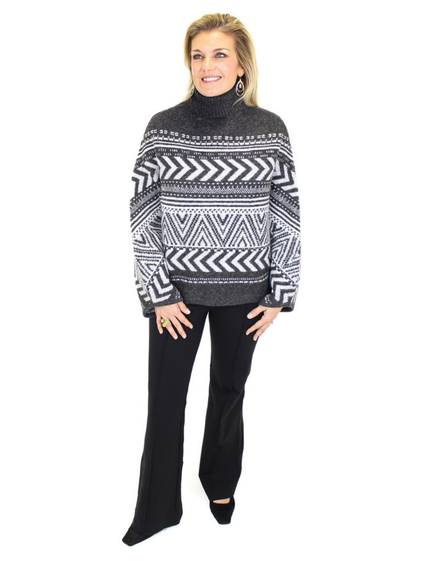 Charlie B Geometric Jacquard Poncho front view with Spanx pants.