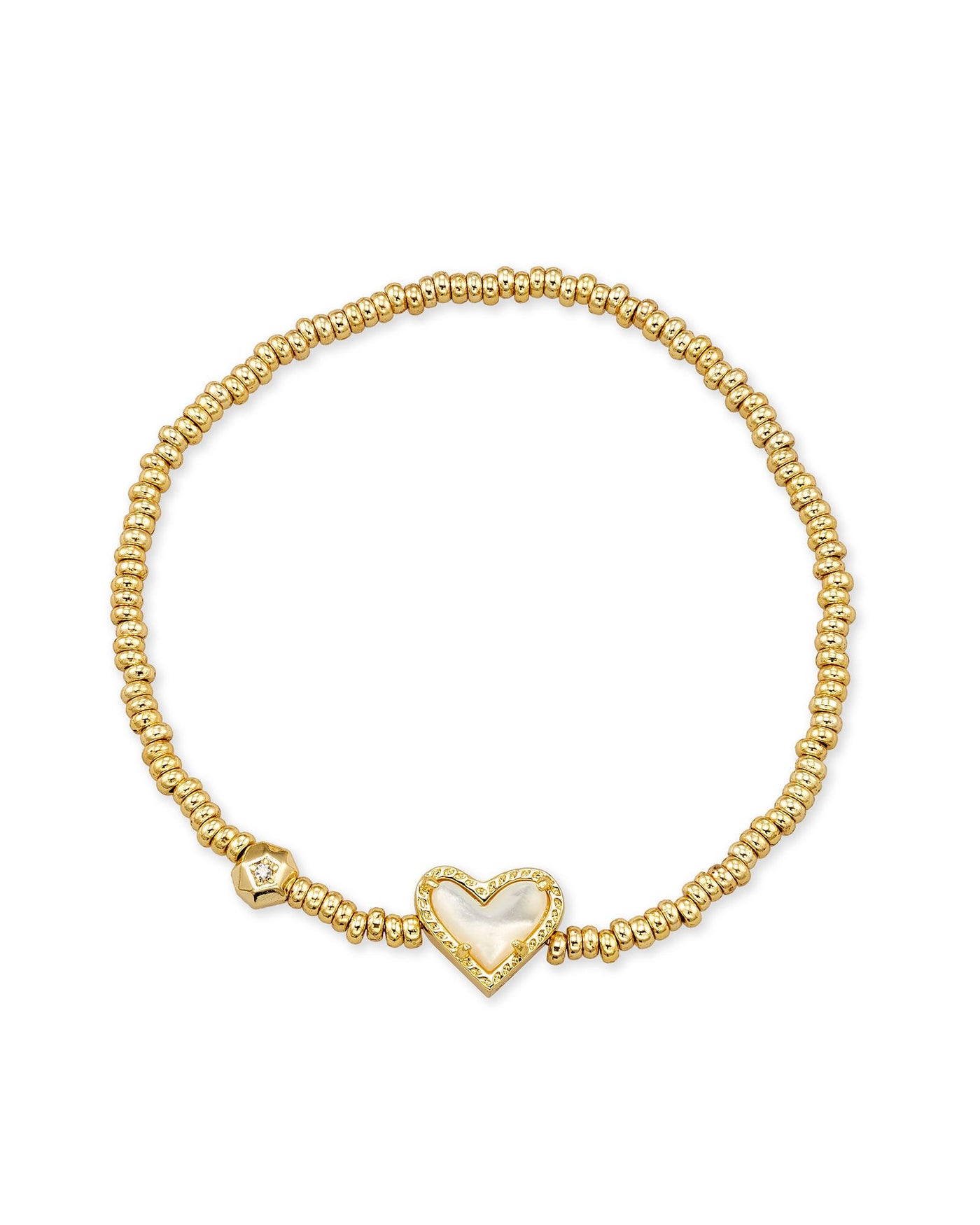 Kendra Scott gold beaded stretch bracelet with mother of pearl heart pendant.