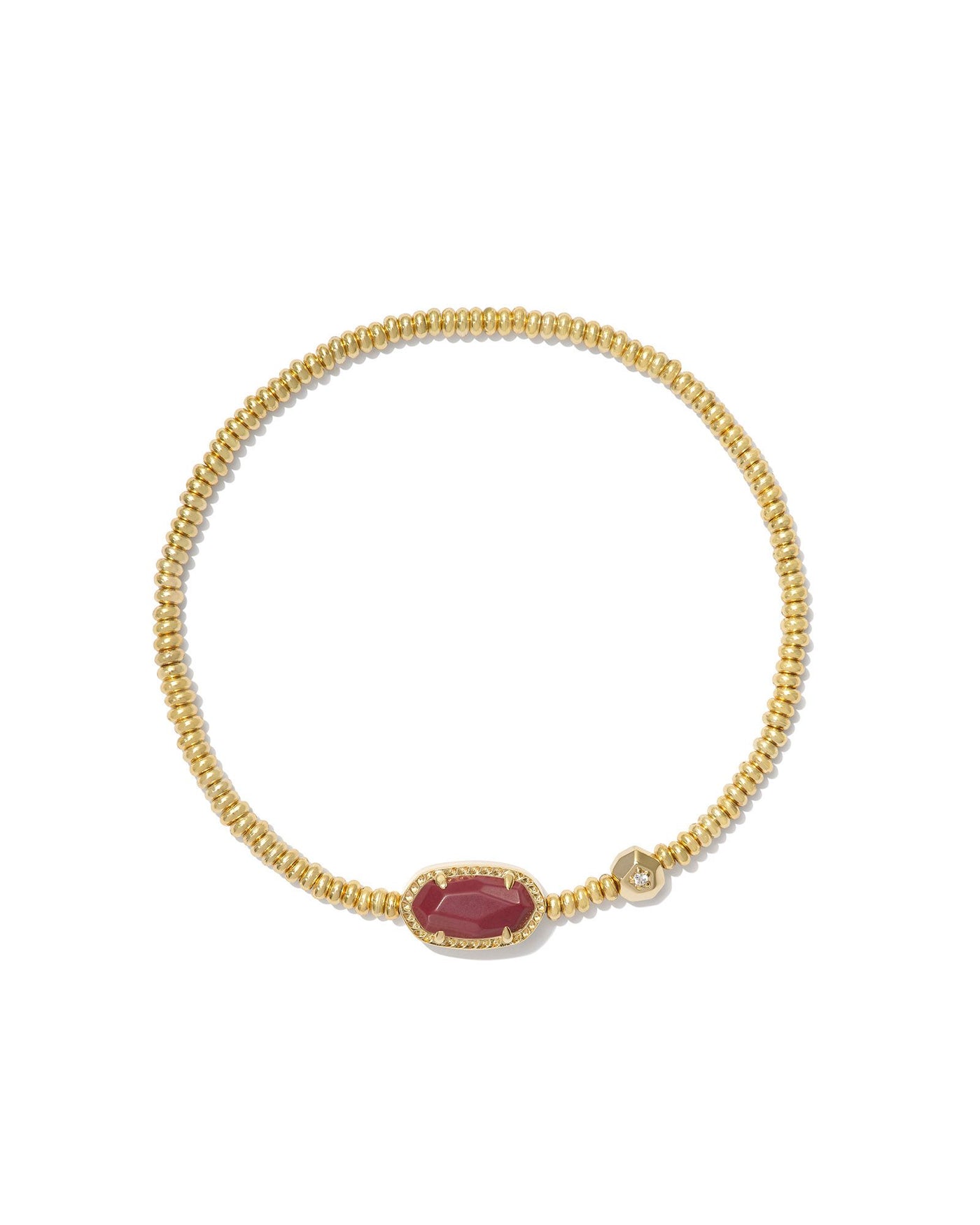 Kendra Scott gold beaded bracelet with maroon pendant.