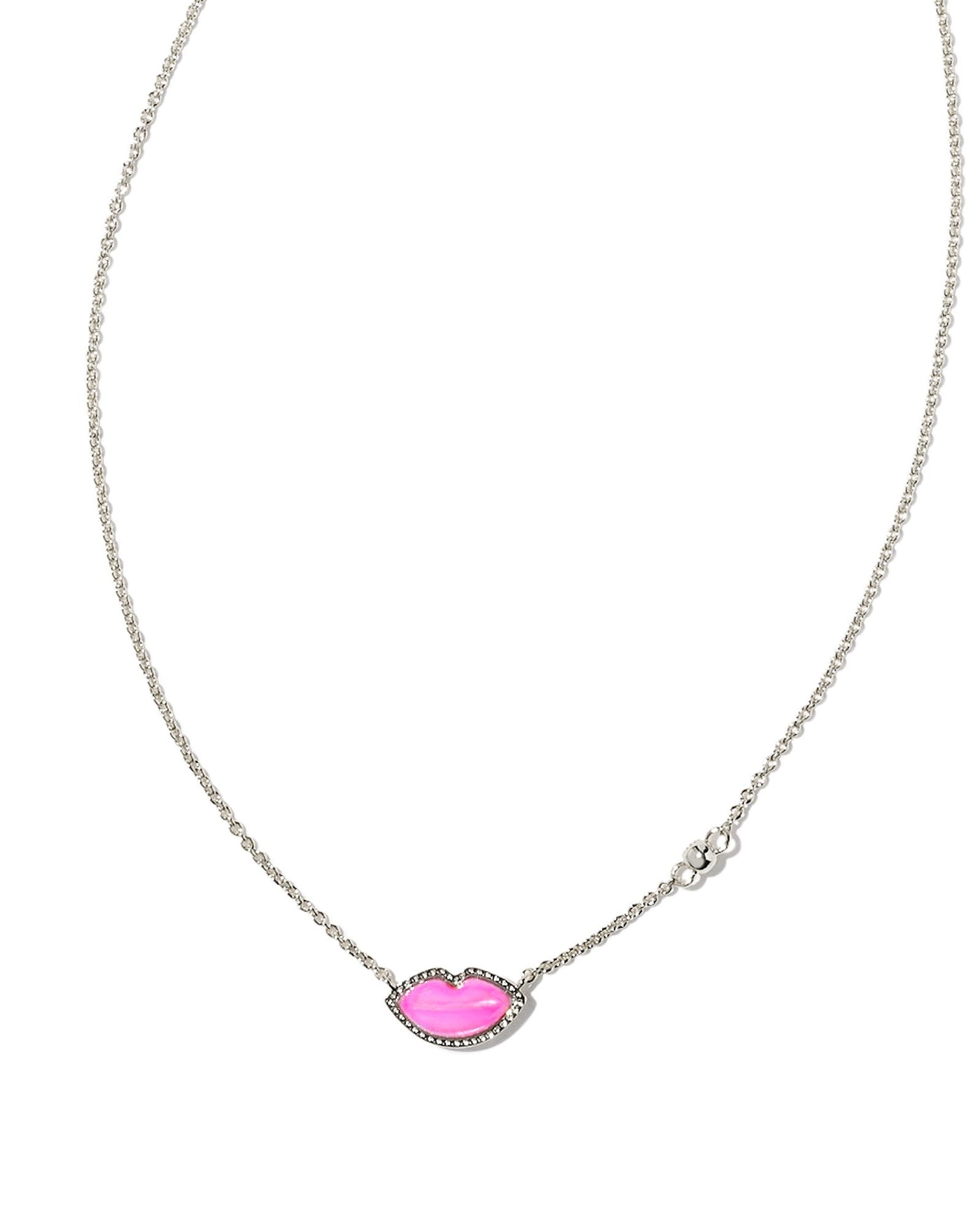 Dainty silver necklace with pink mother of pearl lips pendant, closeup.