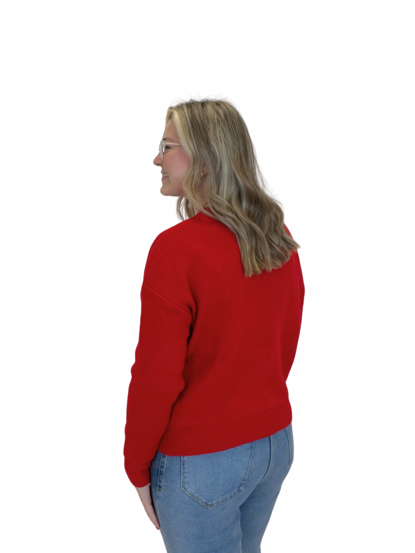 Red "merry" embroidered sweater on model, back view.