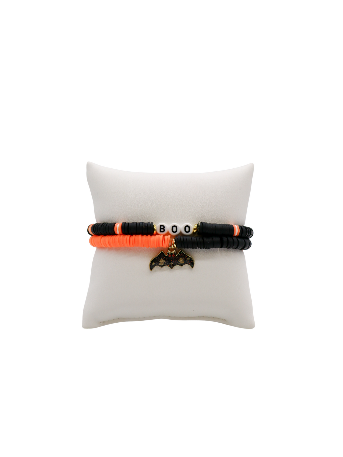 Set of 2 heishi bracelets in black and orange color block pattern with "boo" letter beads and black bat charm.